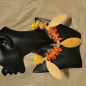 Two Tropical Necklaces with Bonus